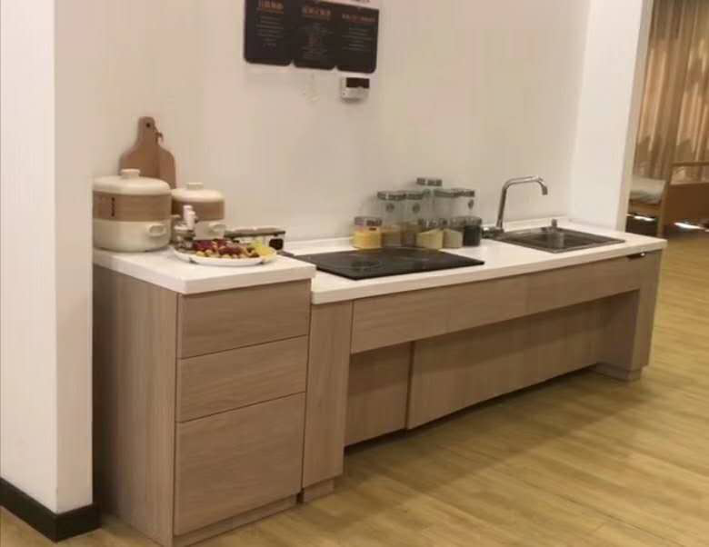 Lifting cabinet table